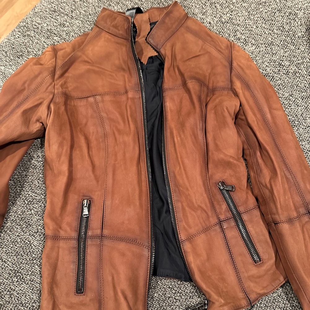 Real Turkish leather jacket. My husband brought it from Turkey but doesn’t fit.